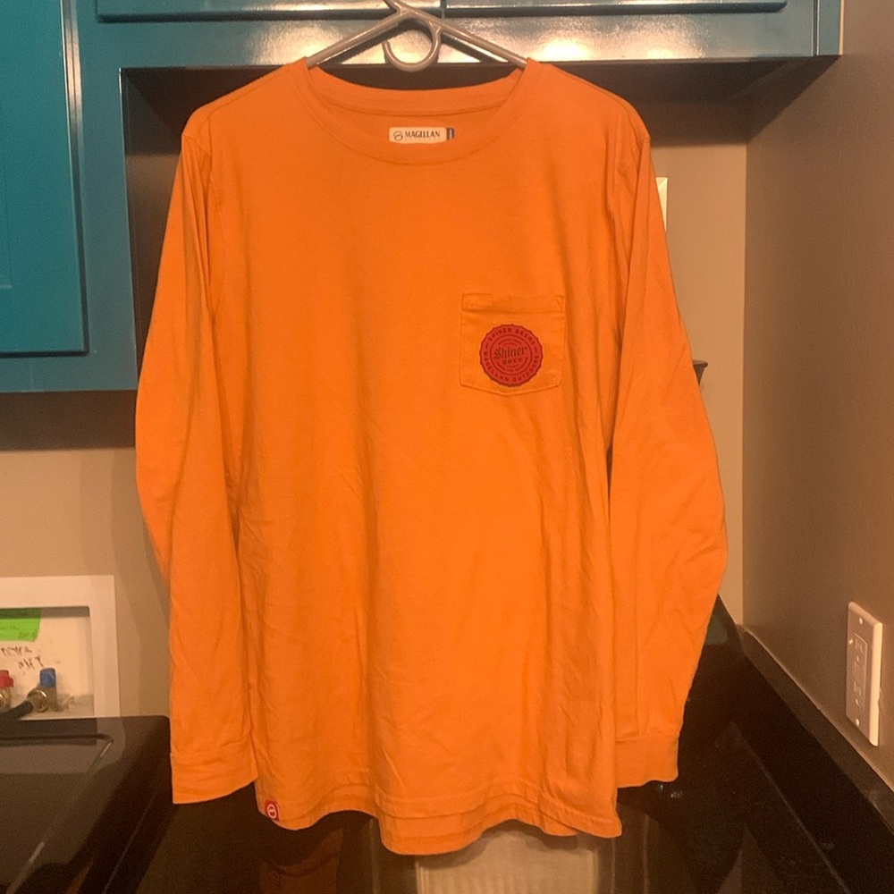 A large Magellan long sleeve shirt.  Moisture wicking multi fabric tee.
